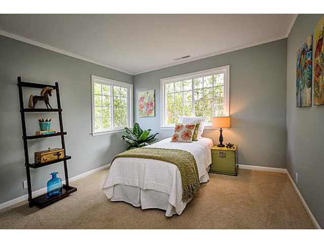 113 Channing Road Burlingame, CA 94010 - Photo 19 of 25 a bedroom with a bed a dresser and a window