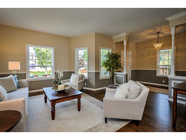 113 Channing Road Burlingame, CA 94010 - Photo 2 of 25 a living room with furniture and a potted plant