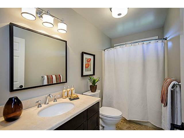 113 Channing Road Burlingame, CA 94010 - Photo 21 of 25 a bathroom with a sink vanity mirror and toilet