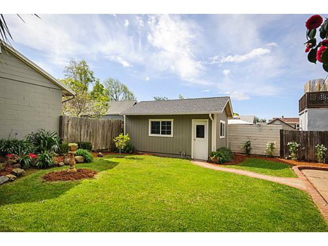 113 Channing Road Burlingame, CA 94010 - Photo 23 of 25 a view of a backyard with a garden and plants
