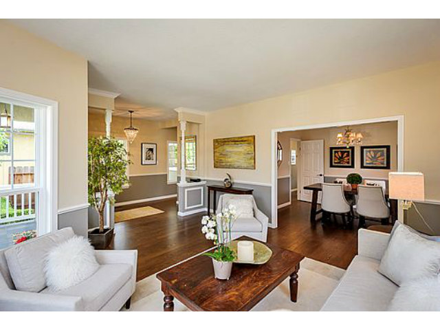 113 Channing Road Burlingame, CA 94010 - Photo 4 of 25 a living room with furniture potted plant and a window
