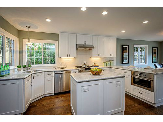 113 Channing Road Burlingame, CA 94010 - Photo 6 of 25 a kitchen with a sink stove and cabinets