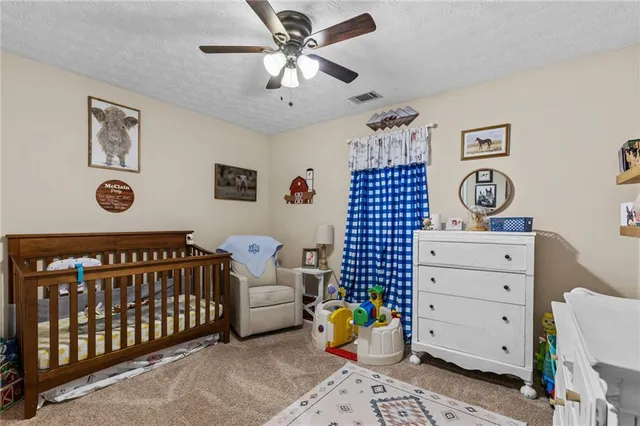 a view of bedroom with furniture