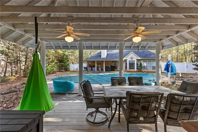a view of a dining tables and chairs in a patio