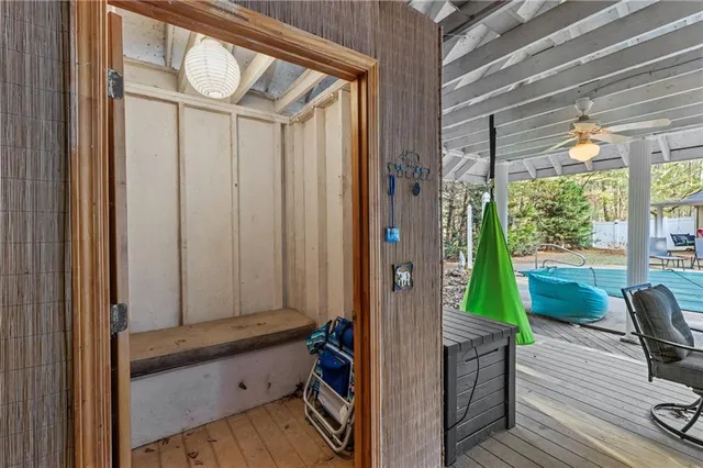 a room with a bed and a large window