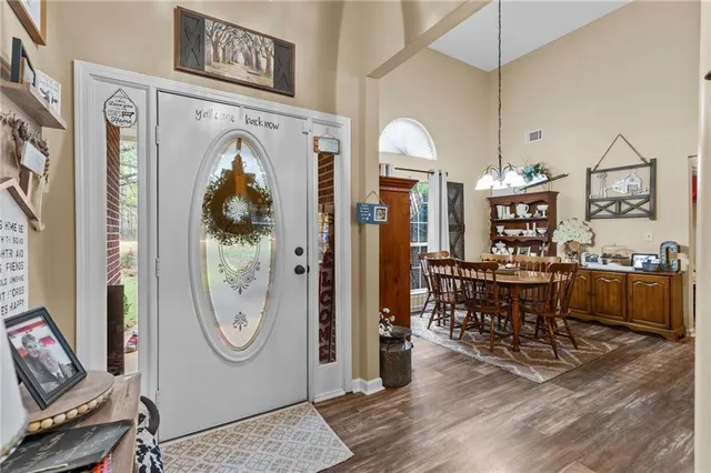 a view of a livingroom with furniture and wooden floor