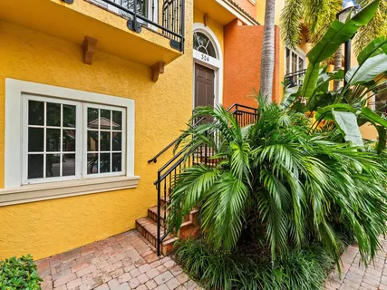 a view of a house with a plant