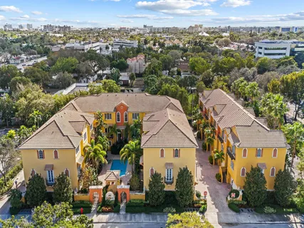 an aerial view of residential building with parking space