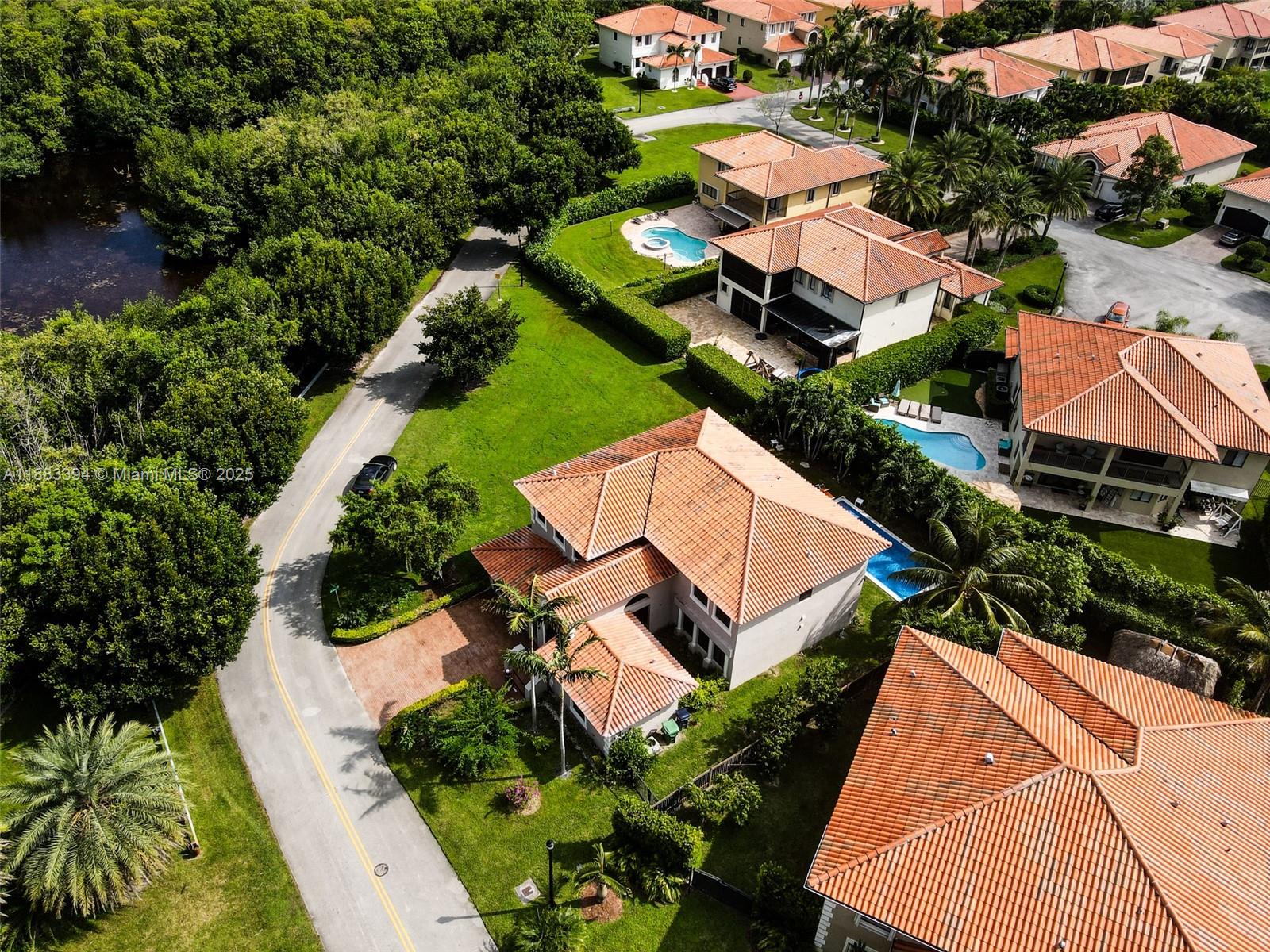7408 Southwest 189th Street Cutler Bay, FL 33157 - Photo 1 of 25 an aerial view of a house with a yard