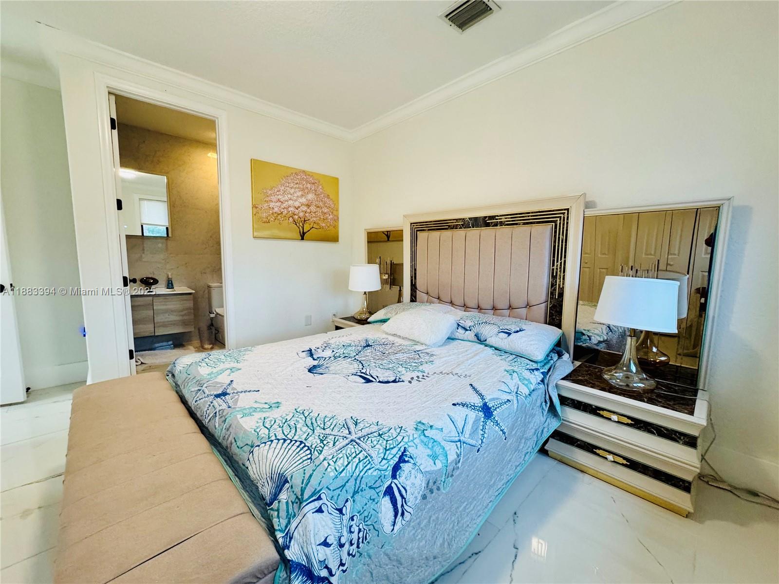 7408 Southwest 189th Street Cutler Bay, FL 33157 - Photo 19 of 25 a bedroom with a bed and wooden floor