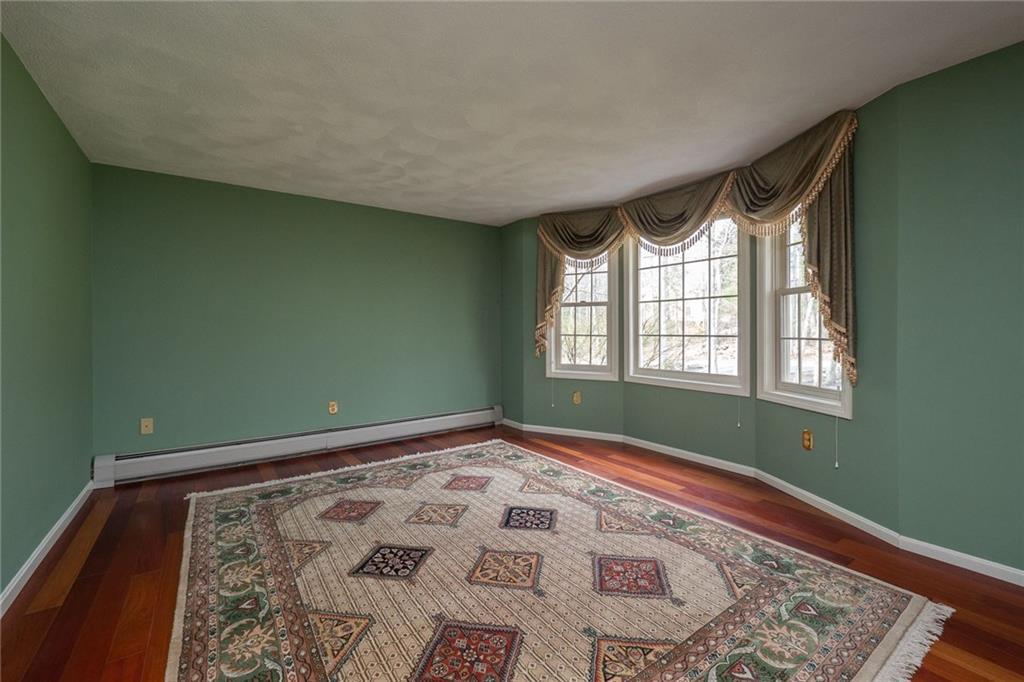 15 Hemlock Ridge Lane York, ME 03909 - Photo 11 of 22 Bay windows and cherry floors accent...