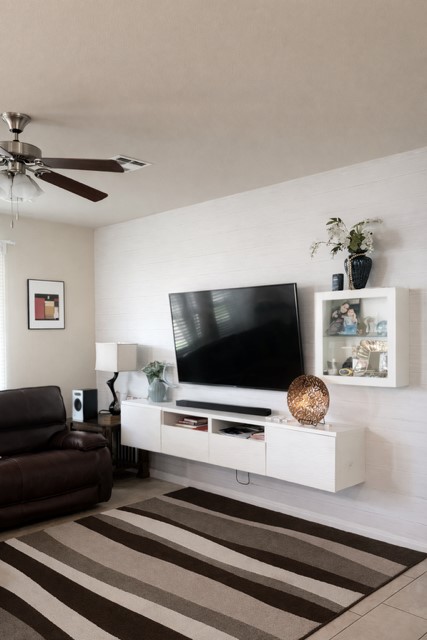 11613 Reading Court Austin, TX 78717 - Photo 4 of 16 a bedroom with furniture and flat screen tv