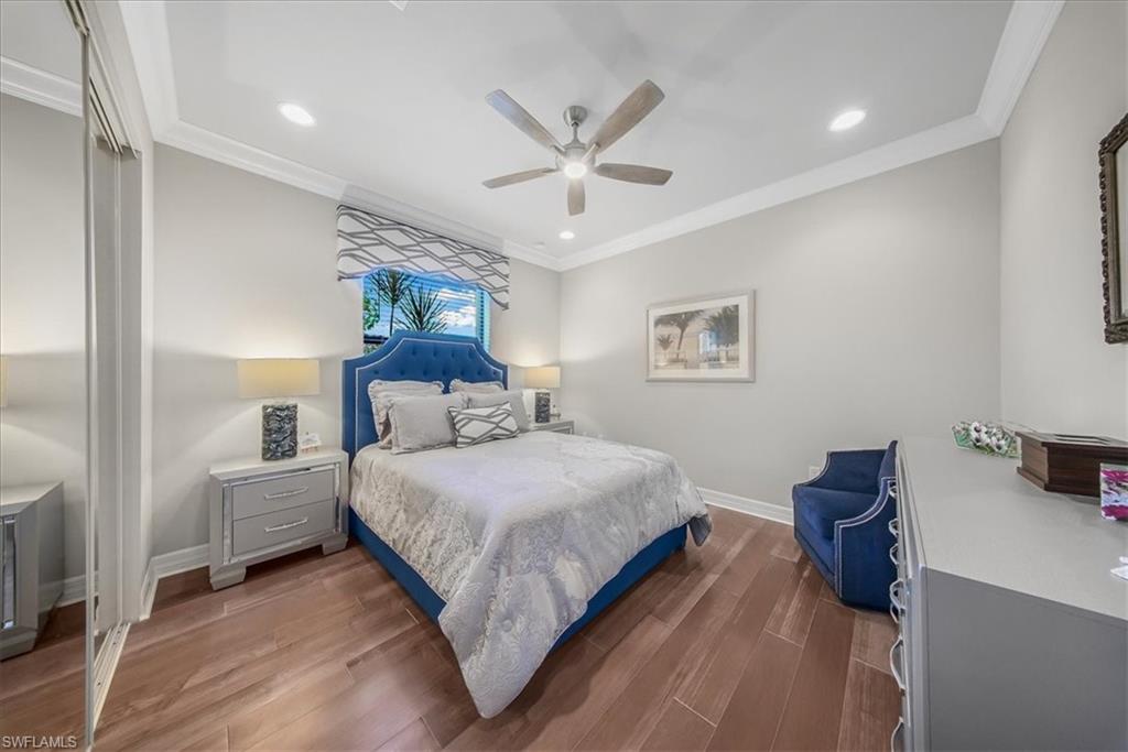 4616 Azalea Drive Naples, FL 34119 - Photo 19 of 44 Bedroom featuring wood finished floors, crown molding, a ceiling fan, a closet, and recessed lighting