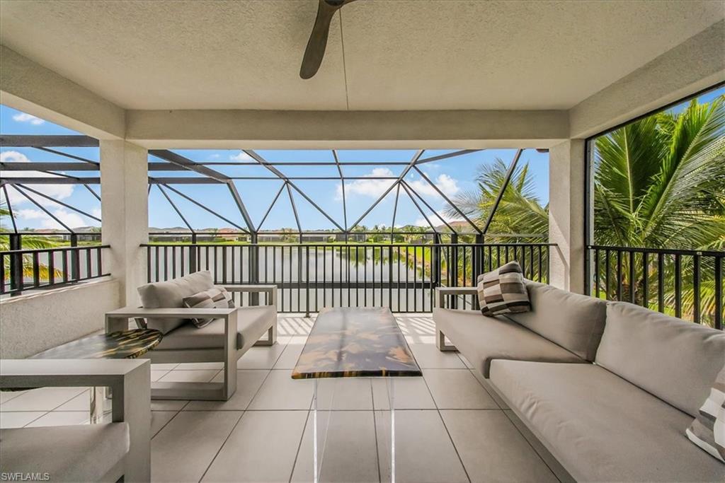 4616 Azalea Drive Naples, FL 34119 - Photo 24 of 44 View of patio with an outdoor hangout area, ceiling fan, a water view, and glass enclosure