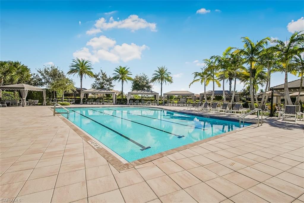 4616 Azalea Drive Naples, FL 34119 - Photo 39 of 44 Community pool with a patio area