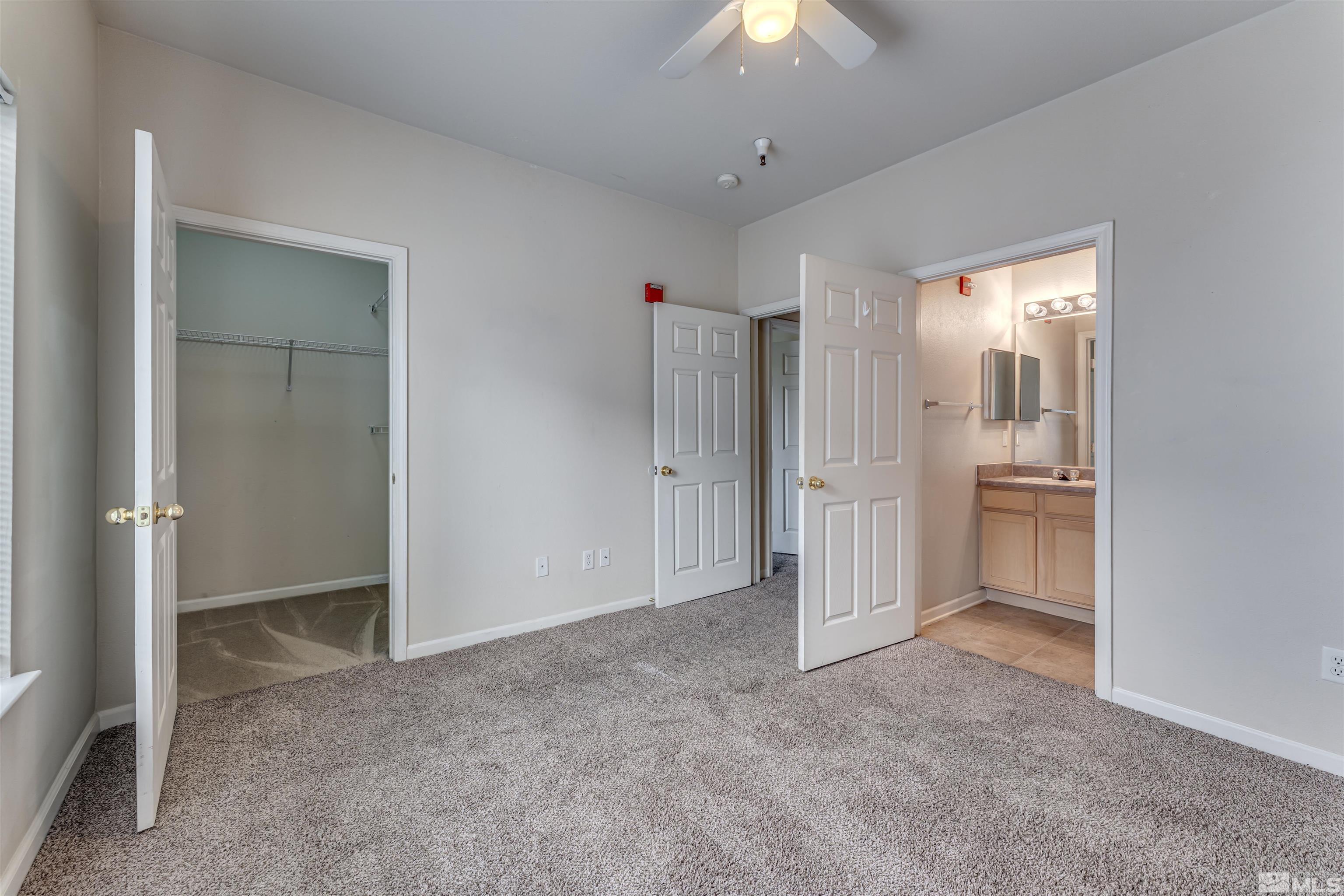 200 Talus Way, Unit 312 Reno, NV 89503 - Photo 18 of 33 an empty room with a bathroom and a bathroom