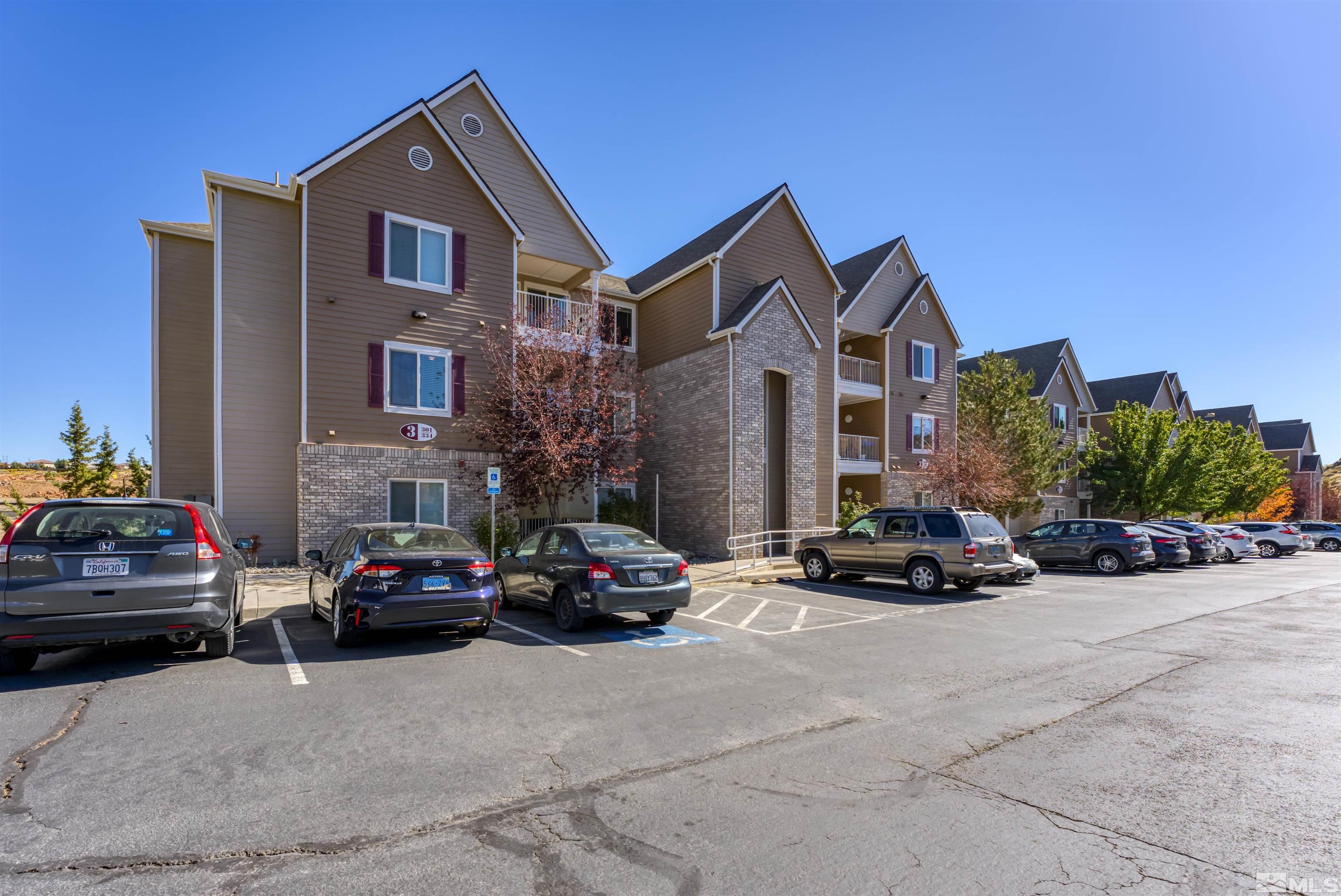 200 Talus Way, Unit 312 Reno, NV 89503 - Photo 2 of 33 a car parked in front of a house