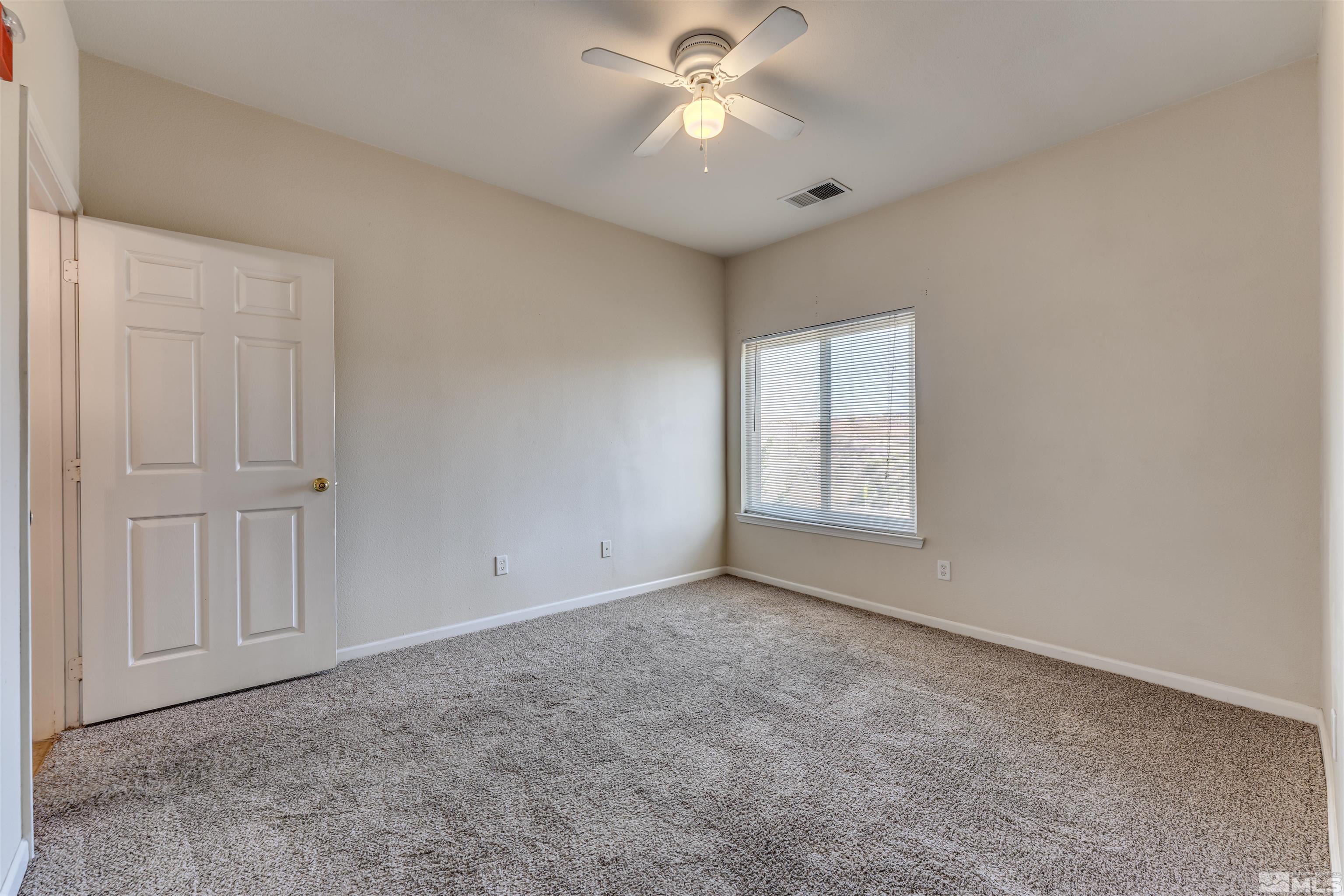 200 Talus Way, Unit 312 Reno, NV 89503 - Photo 23 of 33 a view of an empty room with a window