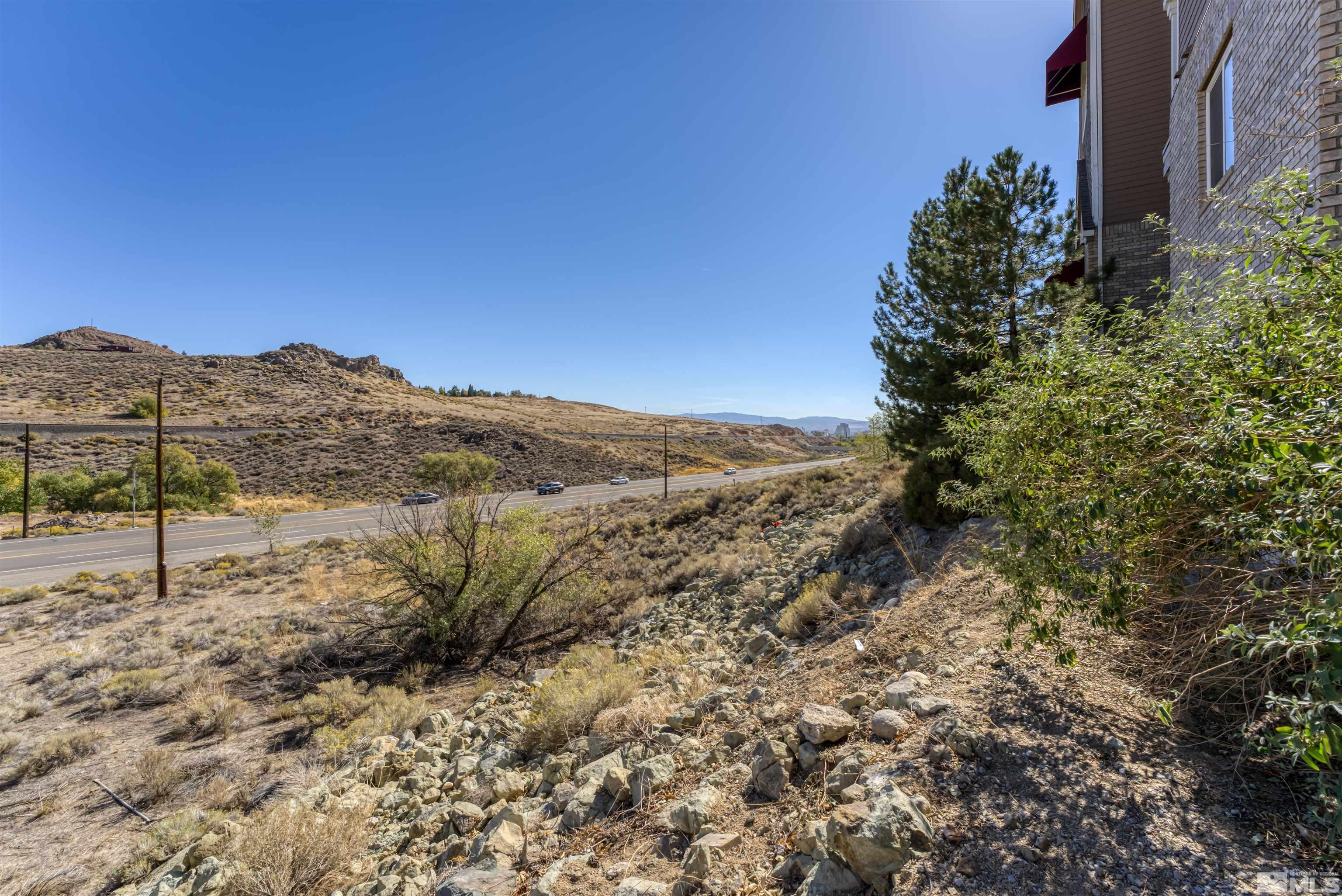 200 Talus Way, Unit 312 Reno, NV 89503 - Photo 26 of 33 a view of a backyard of a house