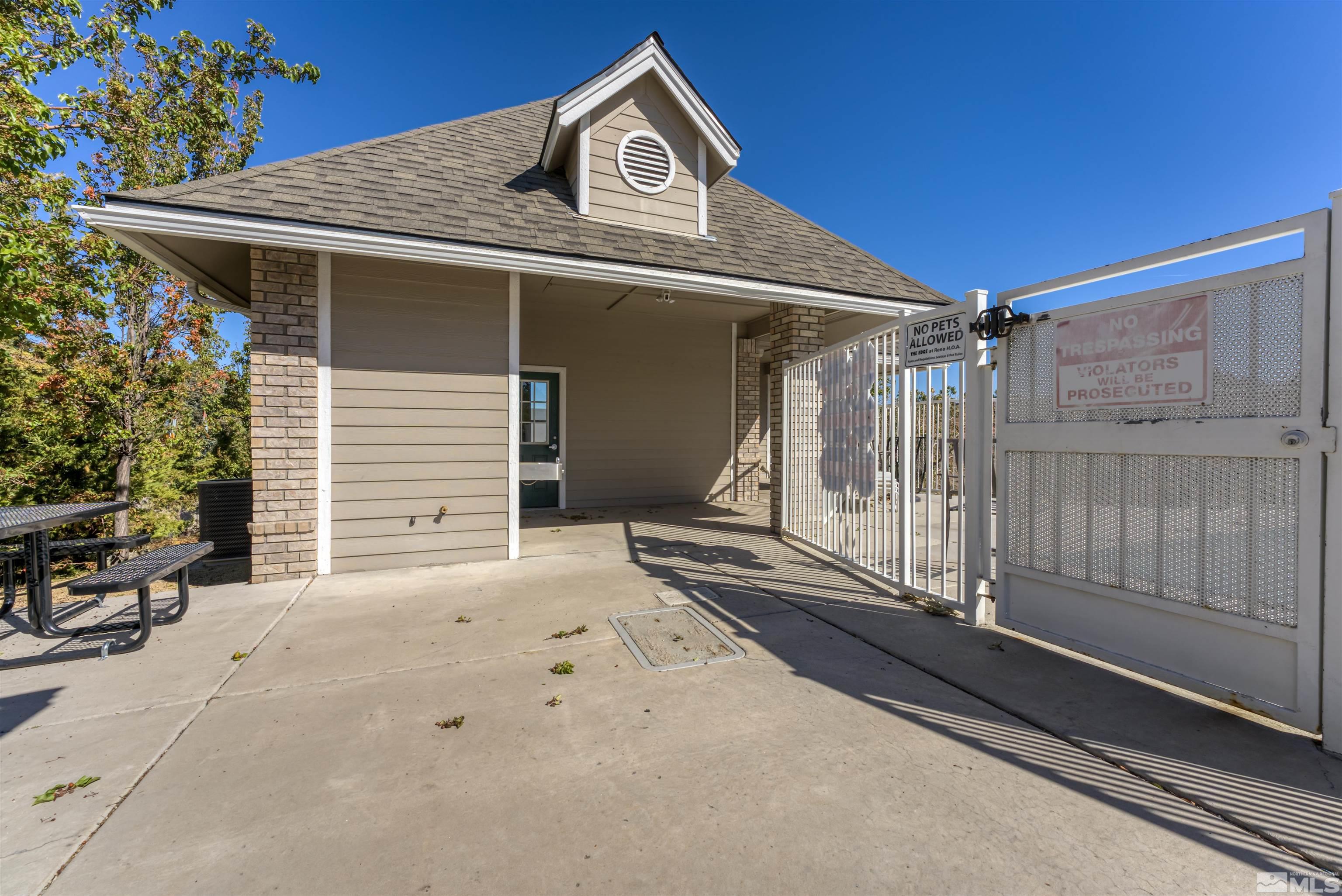 200 Talus Way, Unit 312 Reno, NV 89503 - Photo 31 of 33 a front view of a house with a garage