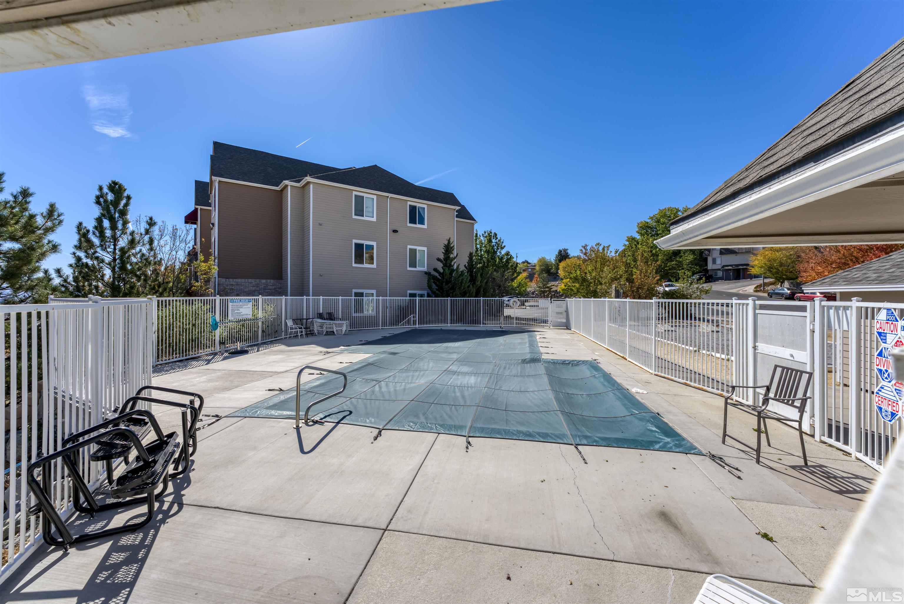 200 Talus Way, Unit 312 Reno, NV 89503 - Photo 32 of 33 a view of a terrace with chairs