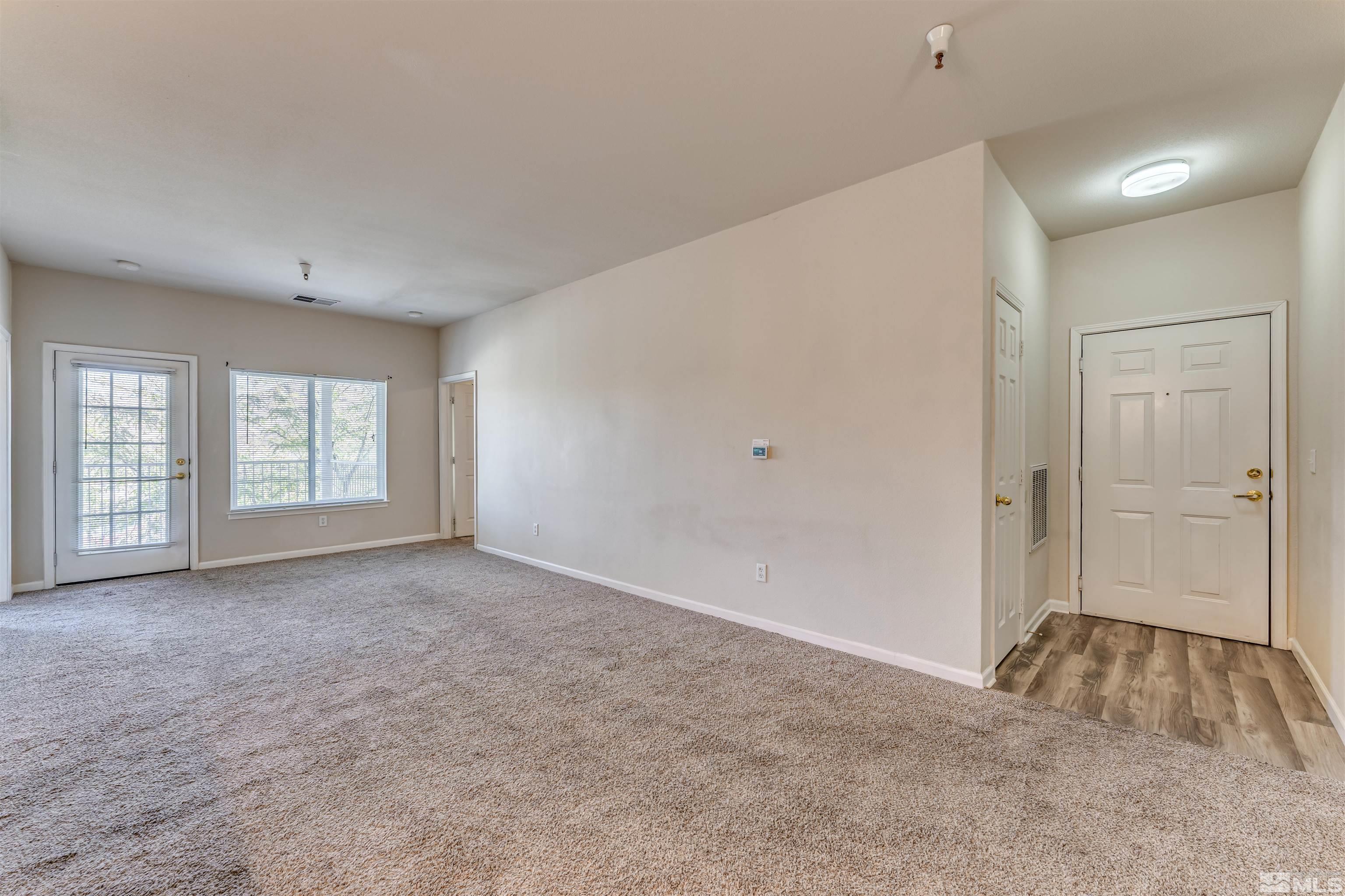 200 Talus Way, Unit 312 Reno, NV 89503 - Photo 4 of 33 a view of an empty room with a window