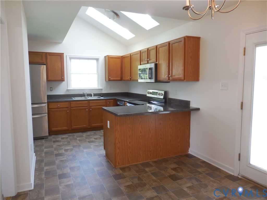 1781 Rolling Path Road Mineral, VA 23117 - Photo 2 of 23 Kitchen featuring vaulted ceilings with skylights,