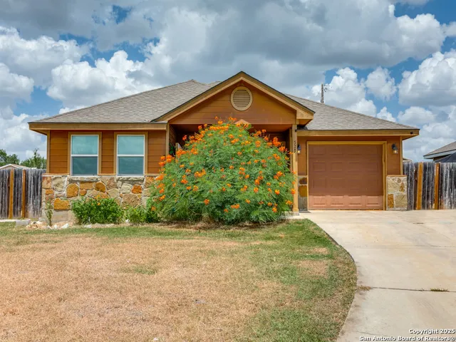 a front view of house with yard
