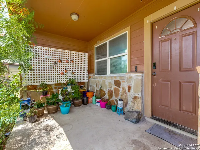 a backyard of a house with seating space