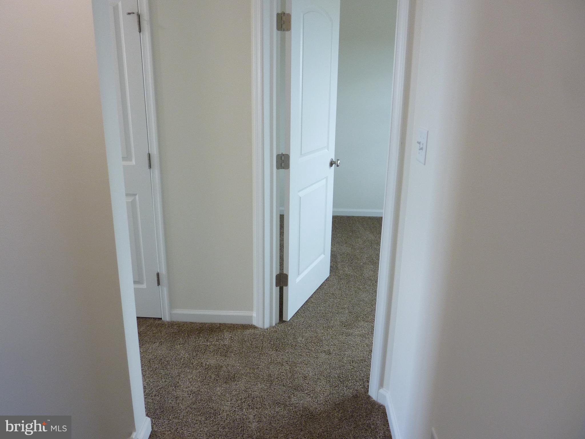 280 Doylestown Road Smyrna, DE 19977 - Photo 15 of 37 a view of a hallway with closet