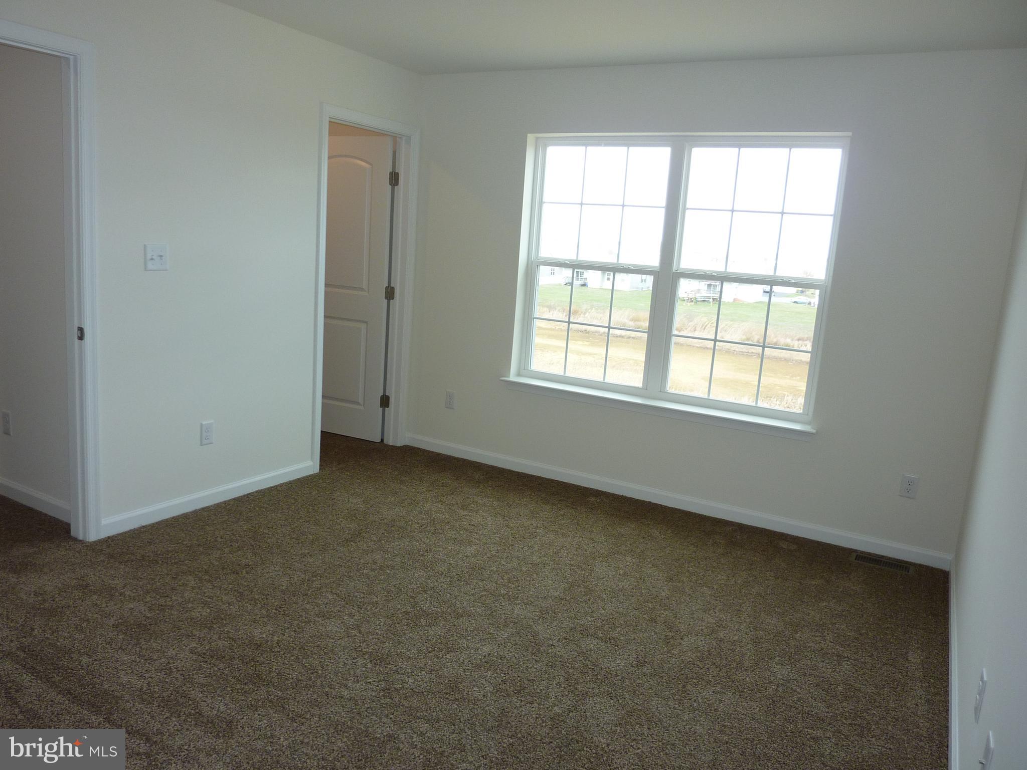 280 Doylestown Road Smyrna, DE 19977 - Photo 16 of 37 an empty room with a window
