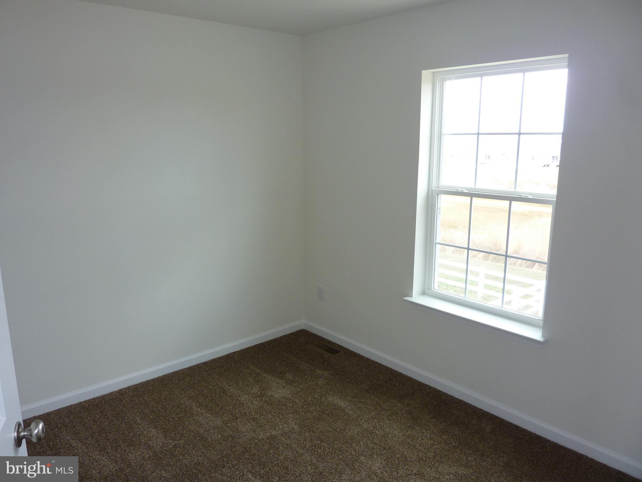 280 Doylestown Road Smyrna, DE 19977 - Photo 23 of 37 an empty room with a window