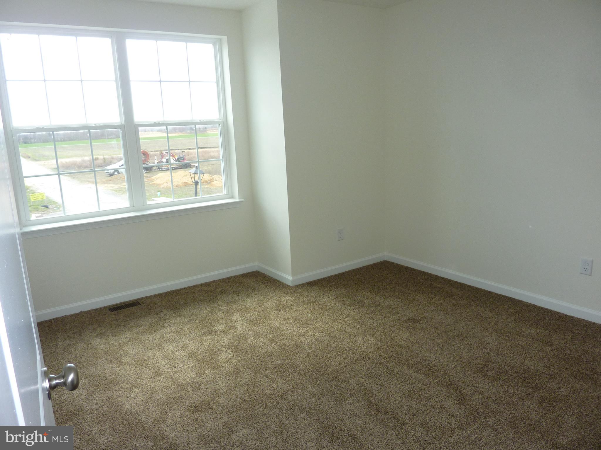 280 Doylestown Road Smyrna, DE 19977 - Photo 26 of 37 an empty room with a window