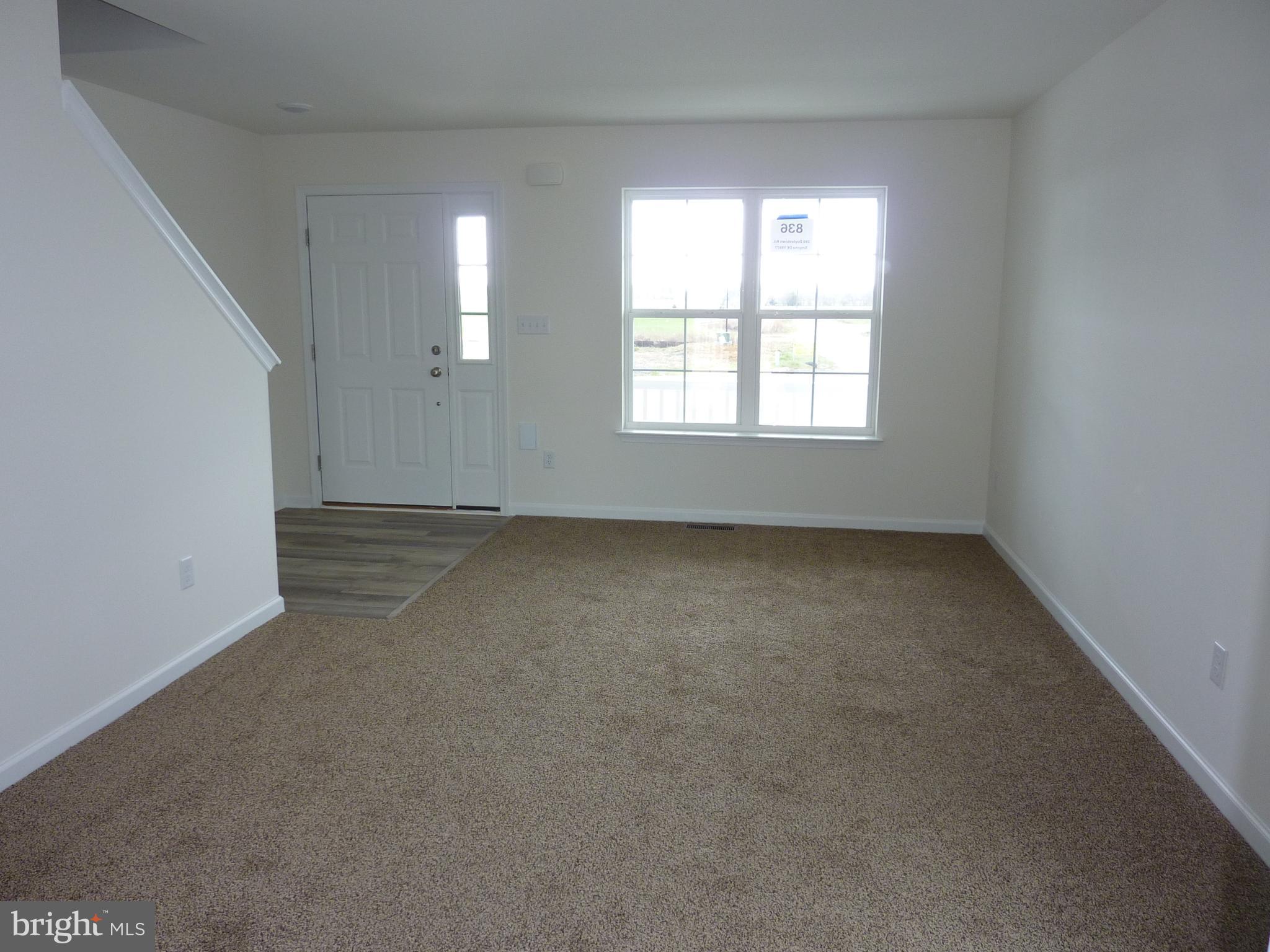 280 Doylestown Road Smyrna, DE 19977 - Photo 4 of 37 an empty room with a window