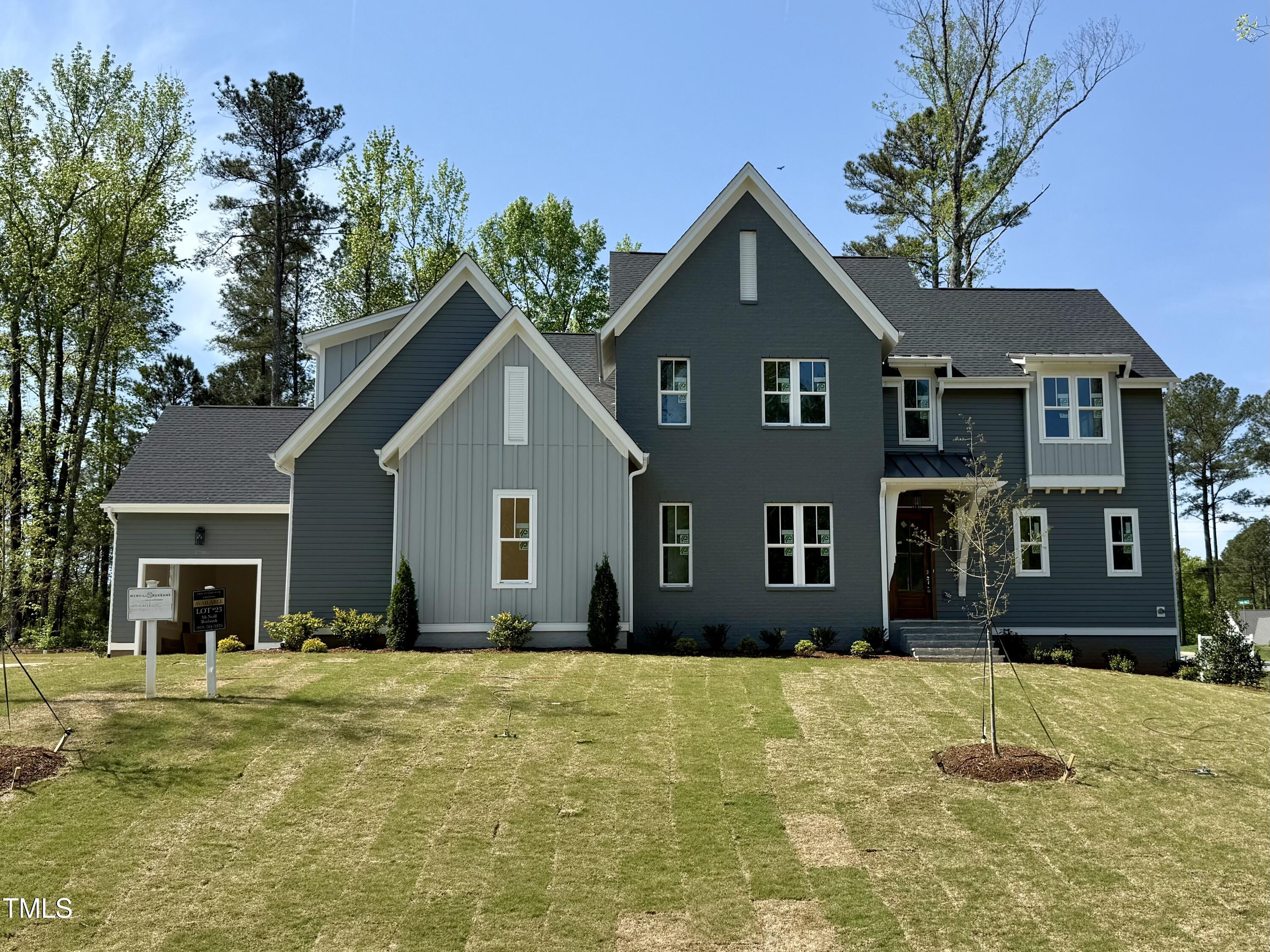 1433 Starry Night Court Raleigh, NC 27613 - Photo 1 of 2 a front view of house with yard and trees in the background