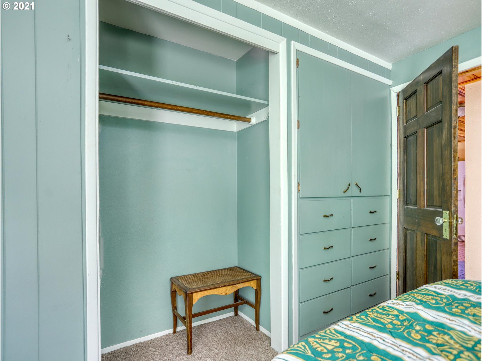 21070 Southeast Bornstedt Road Sandy, OR 97055 - Photo 14 of 31 a bedroom with a bed and a dresser