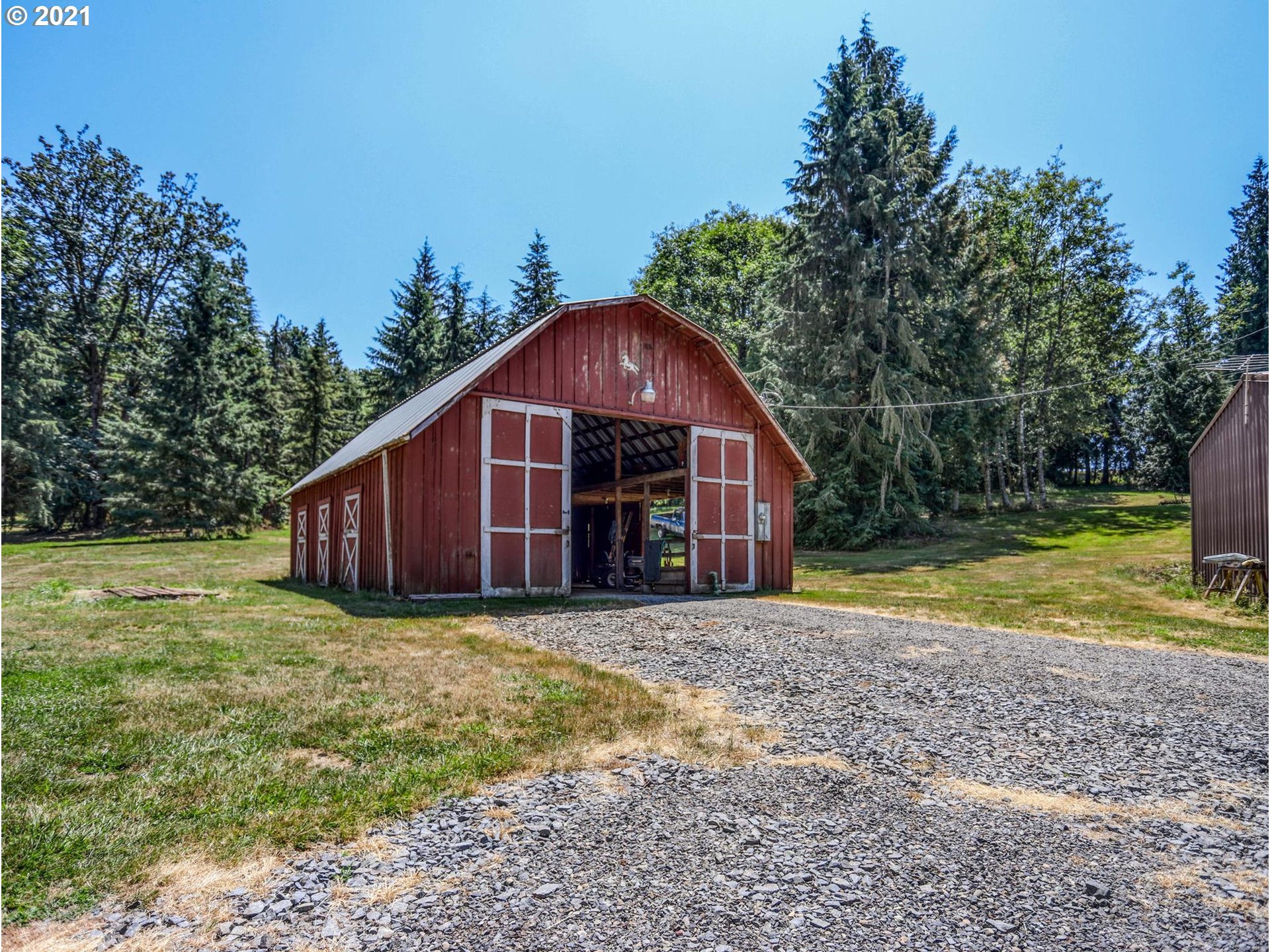 21070 Southeast Bornstedt Road Sandy, OR 97055 - Photo 24 of 31 a view of a house with a yard