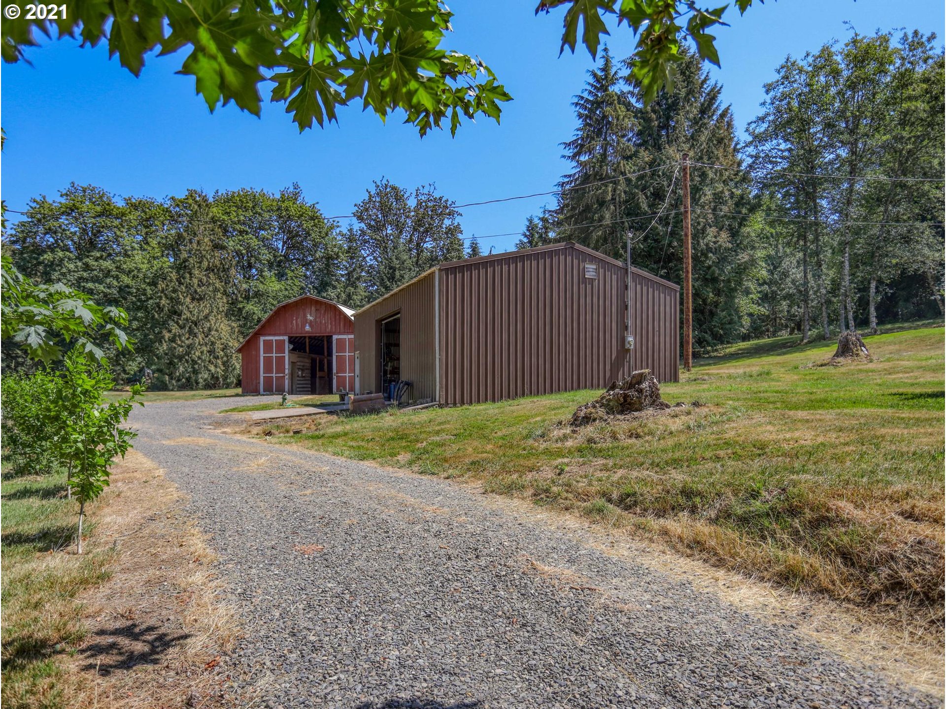 21070 Southeast Bornstedt Road Sandy, OR 97055 - Photo 26 of 31 a backyard of a house with lots of green space