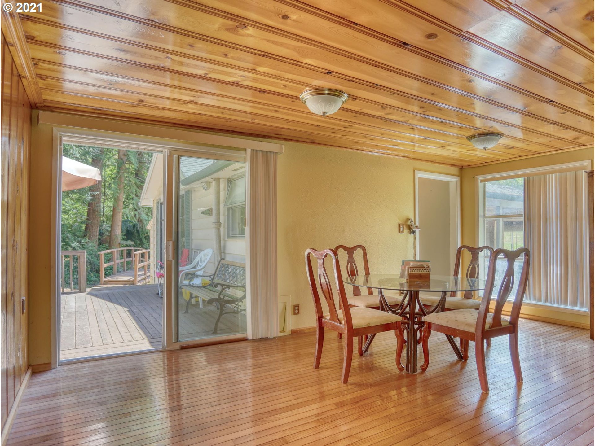 21070 Southeast Bornstedt Road Sandy, OR 97055 - Photo 8 of 31 a view of a dining room with furniture and wooden floor