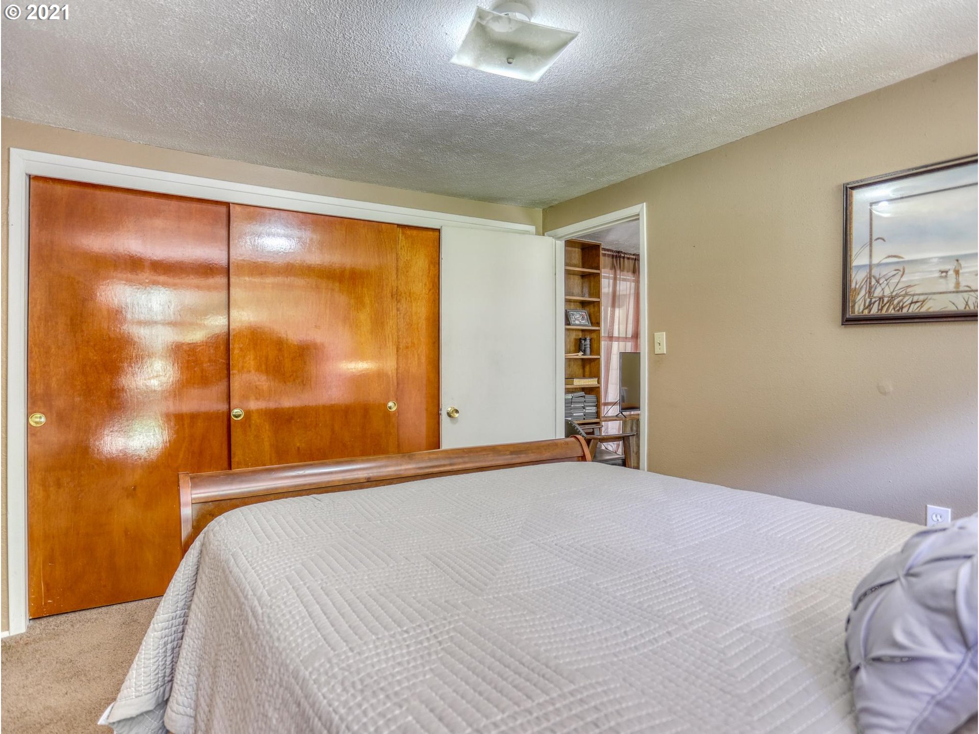 21070 Southeast Bornstedt Road Sandy, OR 97055 - Photo 10 of 31 a bedroom with a bed and a window