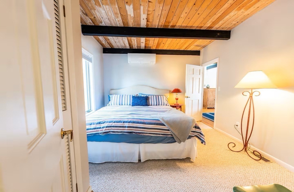 44 Ye Olde County Road Gloucester, MA 01930 - Photo 11 of 35 a bedroom with a bed and a window