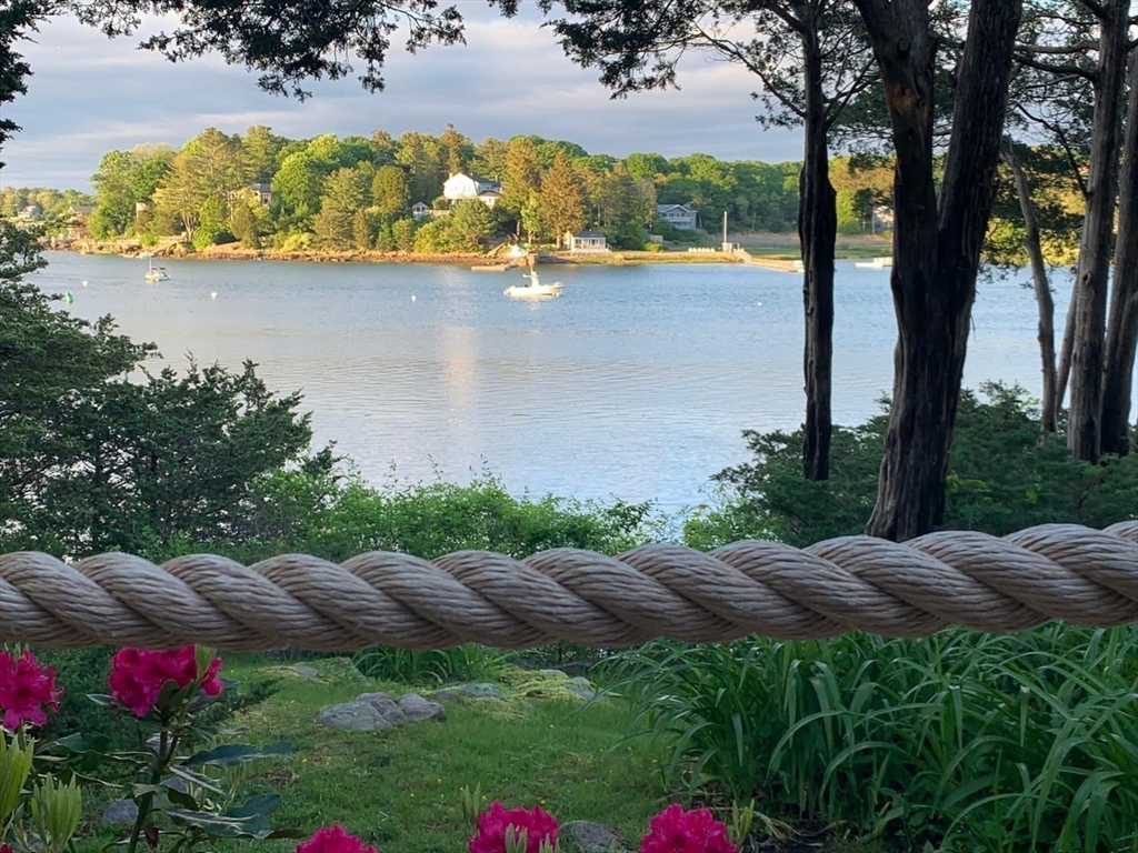 44 Ye Olde County Road Gloucester, MA 01930 - Photo 23 of 35 a view of lake from balcony with outdoor seating