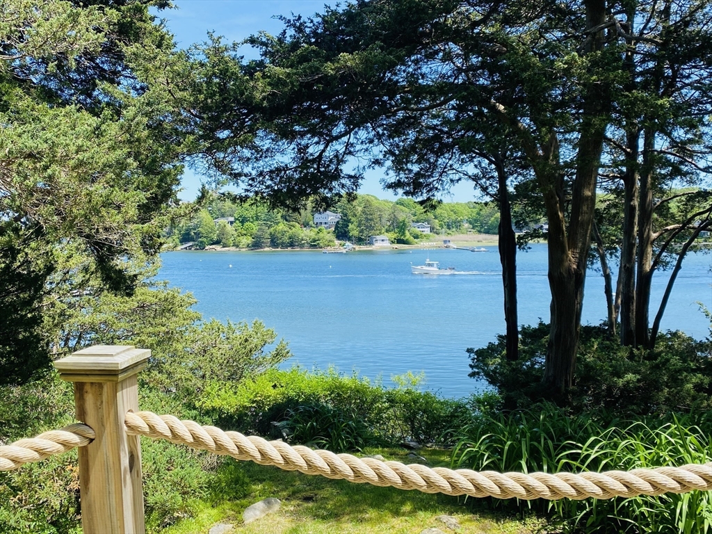 44 Ye Olde County Road Gloucester, MA 01930 - Photo 3 of 35 a view of a garden with large trees