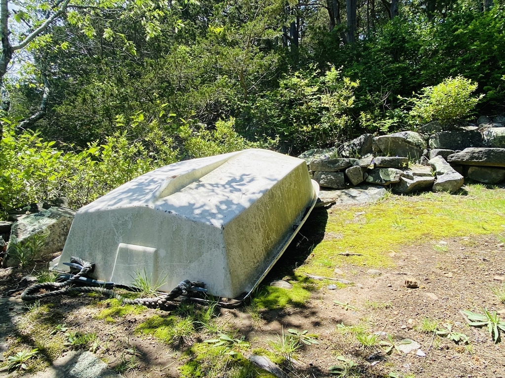 44 Ye Olde County Road Gloucester, MA 01930 - Photo 32 of 35 a view of swimming pool with lawn chairs under an umbrella
