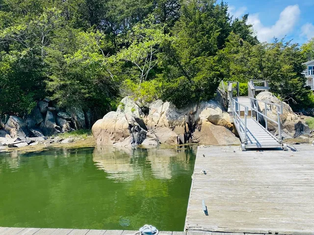 a view of a wooden floor and a lake view