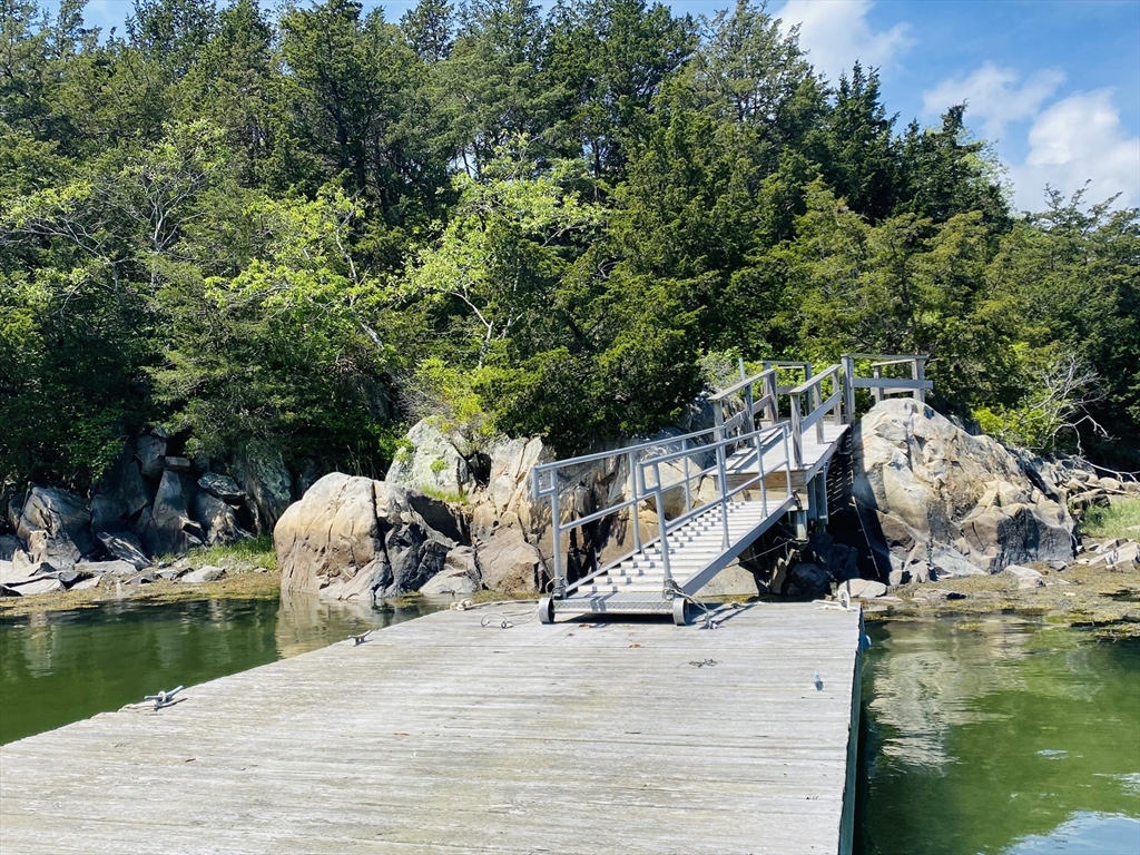 44 Ye Olde County Road Gloucester, MA 01930 - Photo 34 of 35 a view of a wooden floor and a lake view