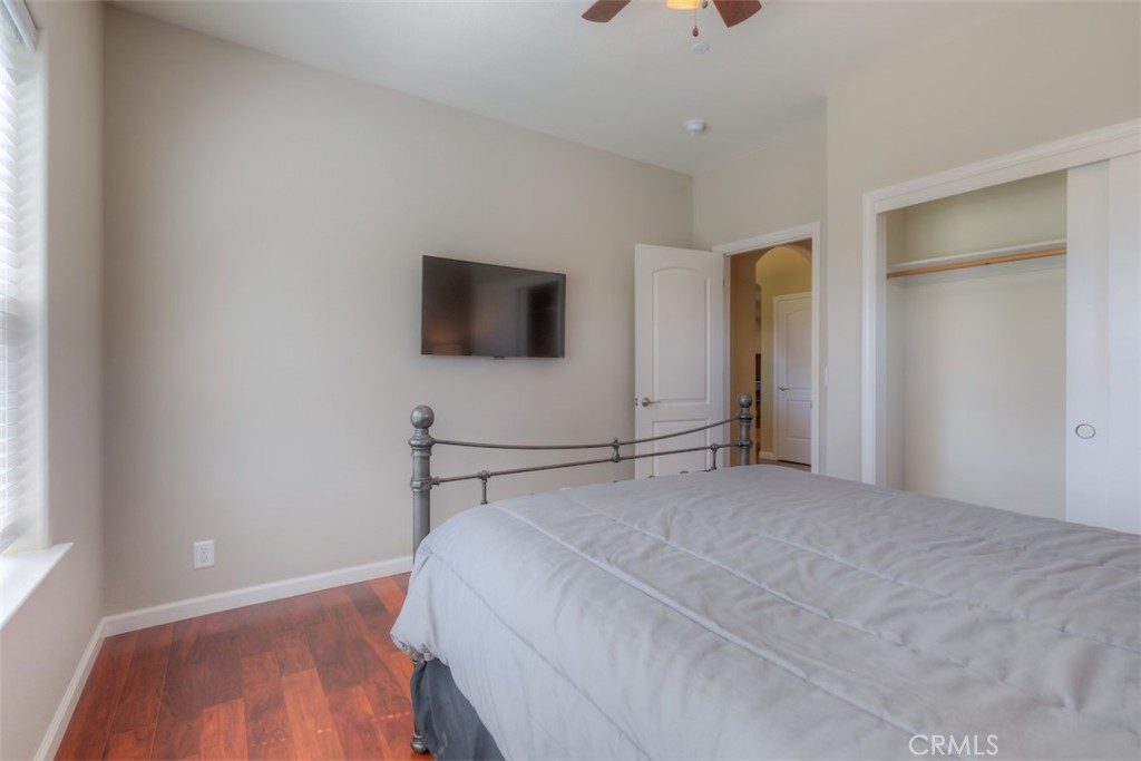 95 Sutter Road Paradise, CA 95969 - Photo 23 of 47 a bedroom with a bed and a flat screen tv