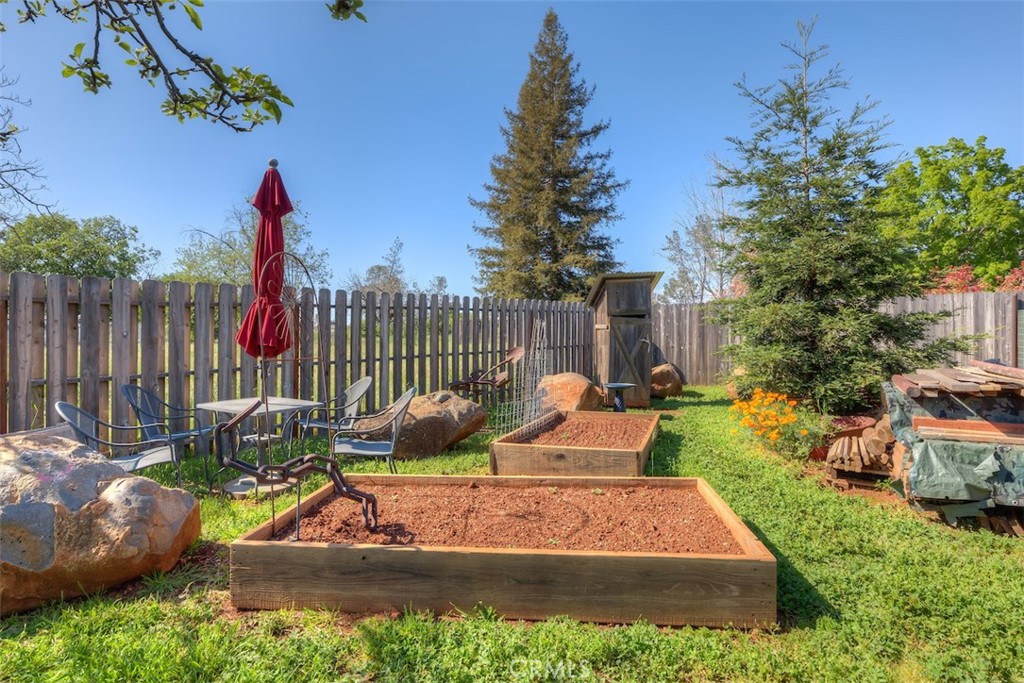 95 Sutter Road Paradise, CA 95969 - Photo 39 of 47 a view of a backyard with sitting area and furniture