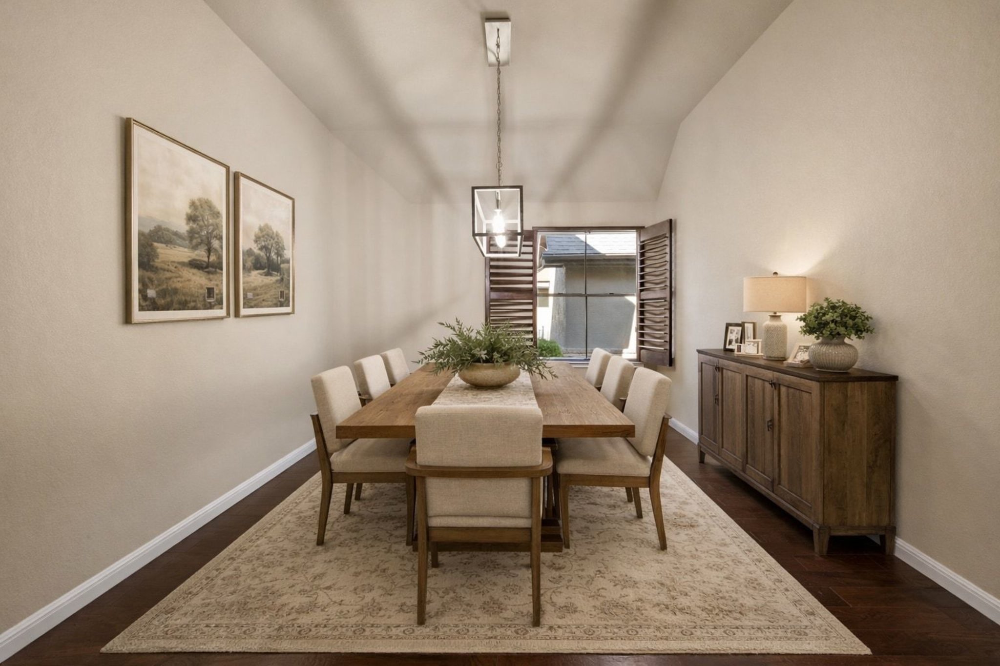 22204 Red Yucca Road Spicewood, TX 78669 - Photo 14 of 34 Dining space with dark wood-type flooring and lofted ceiling