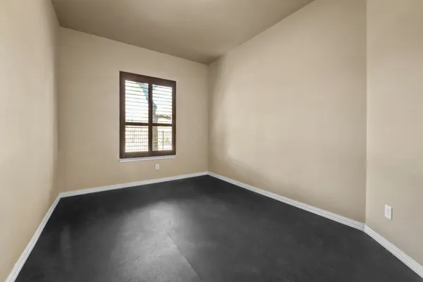 a dining room with furniture a rug and wooden floor